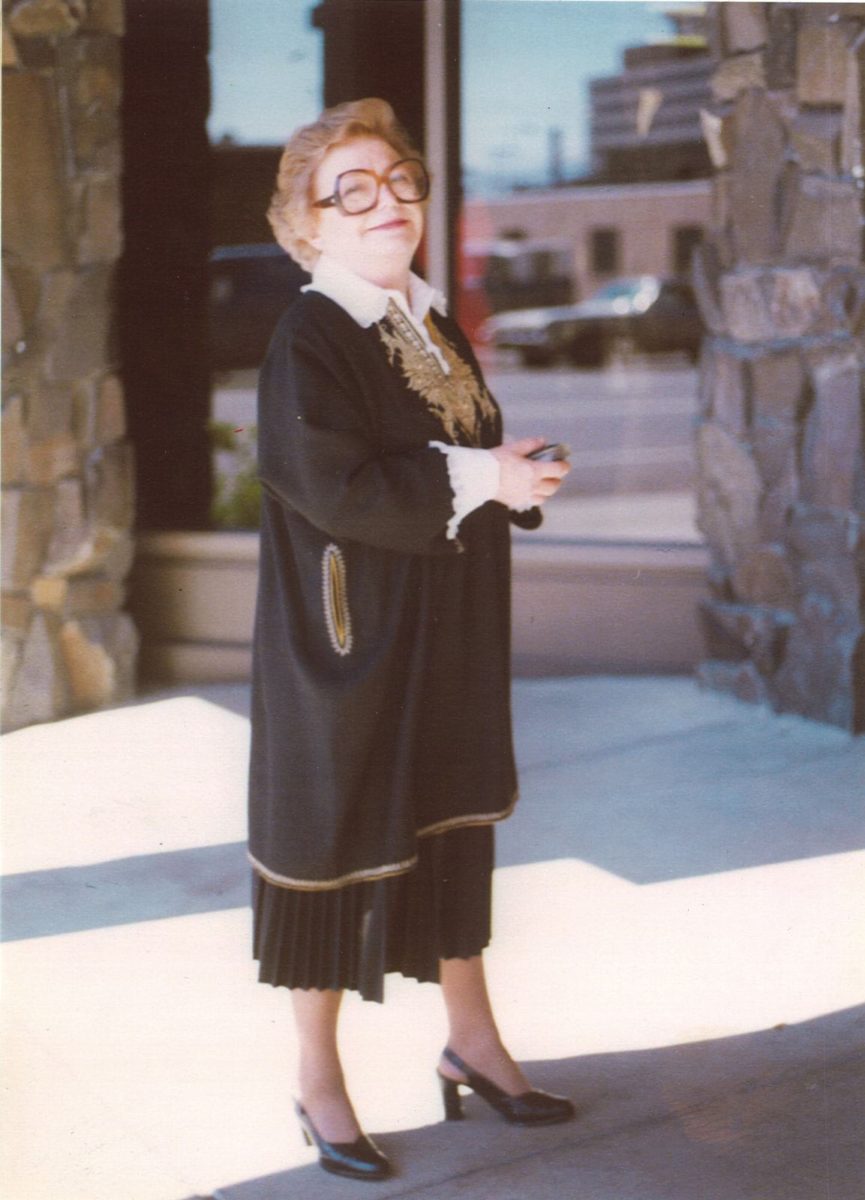 Woman in black clothing smiling